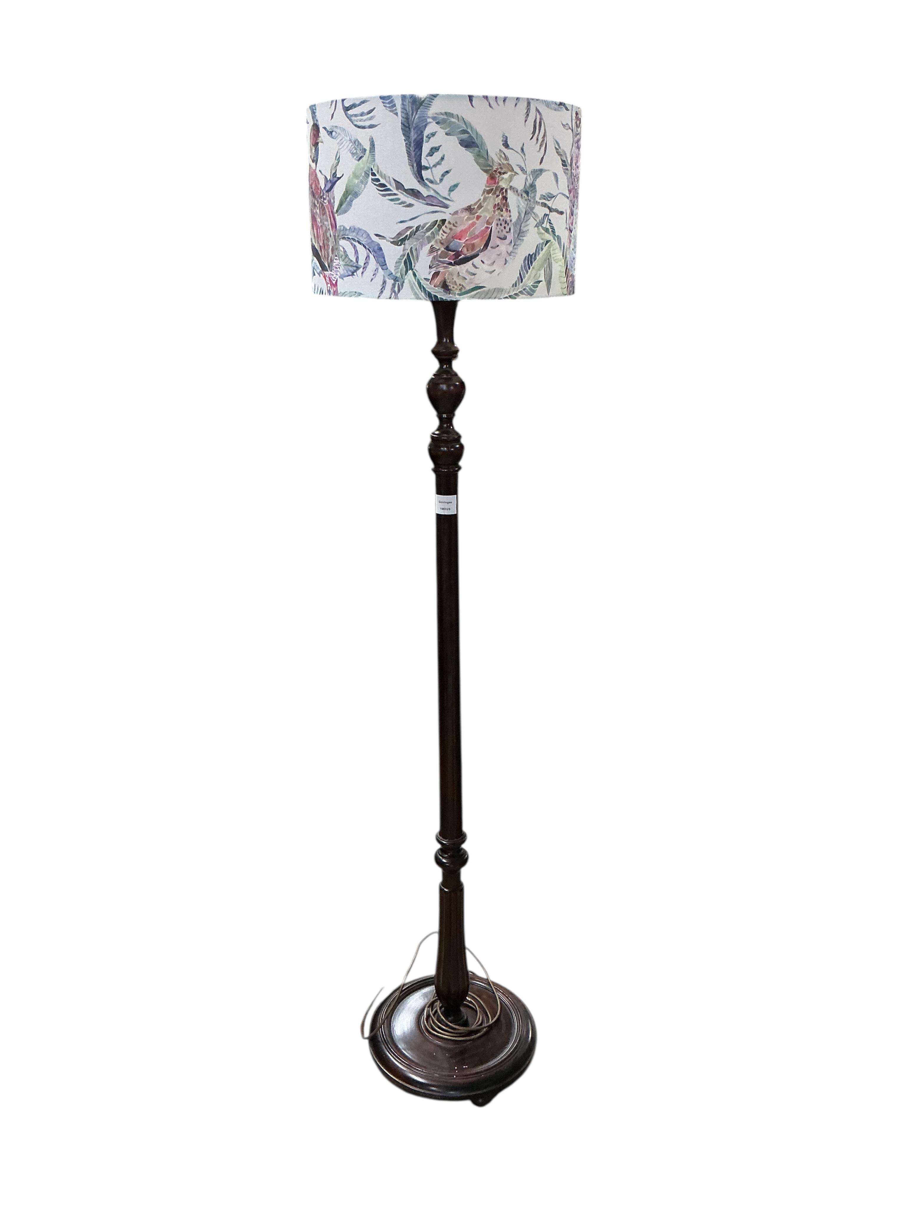 A mahogany standard lamp with shade, height 170cm
